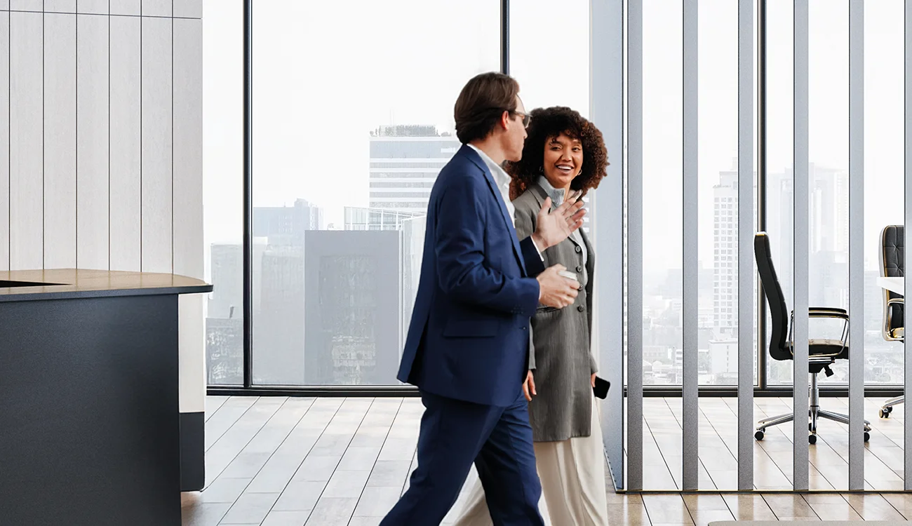 People walking through an office