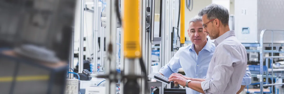 Two men on construction site