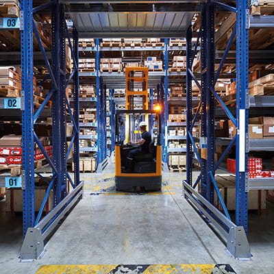 Forklift in warehouse